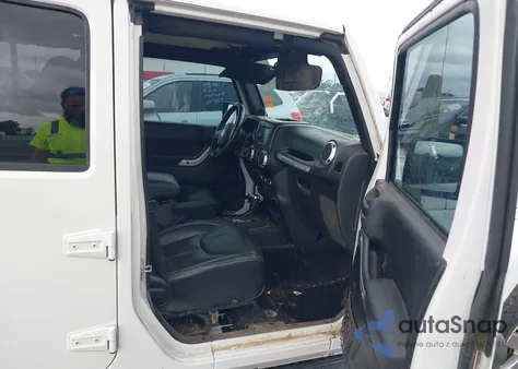 2013 Jeep Wrangler Unlimited Sahara z USA, uszkodzony, nr VIN 1C4BJWEG3DL677904